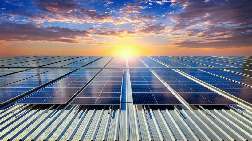 Solar panel array against a clear sky